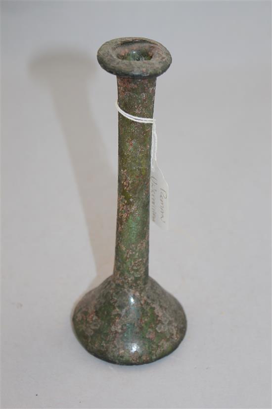 A Roman green glass unguentarium, c.2nd century AD, 18cm